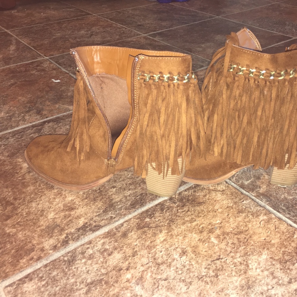 Brown fringe boots